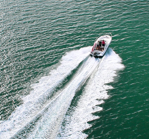 speed boat on lake