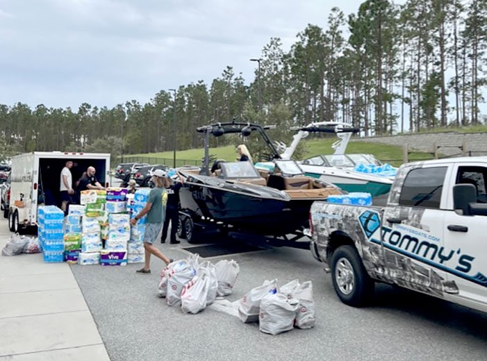 hurricane volunteers with boats